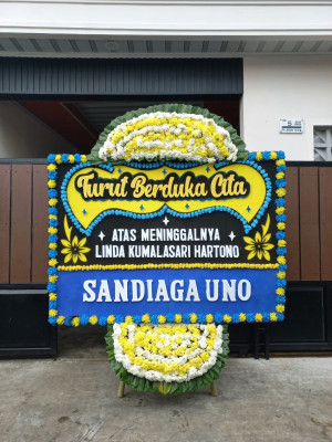 Papan Bunga Duka di Karang Suraga